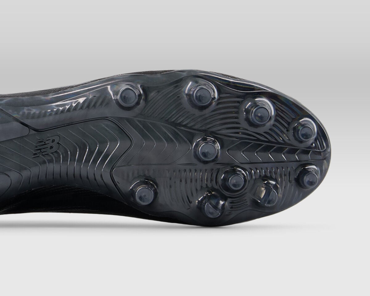 Cleats with black sole